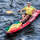 A man with a Pride flag enjoys a safer, less explosive way to boat.